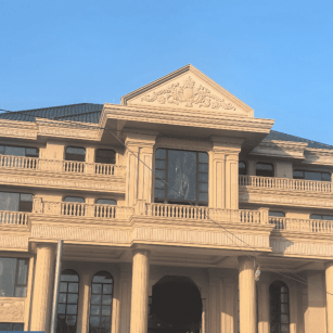 珠海黄金麻别墅外墙干挂石材效果示例