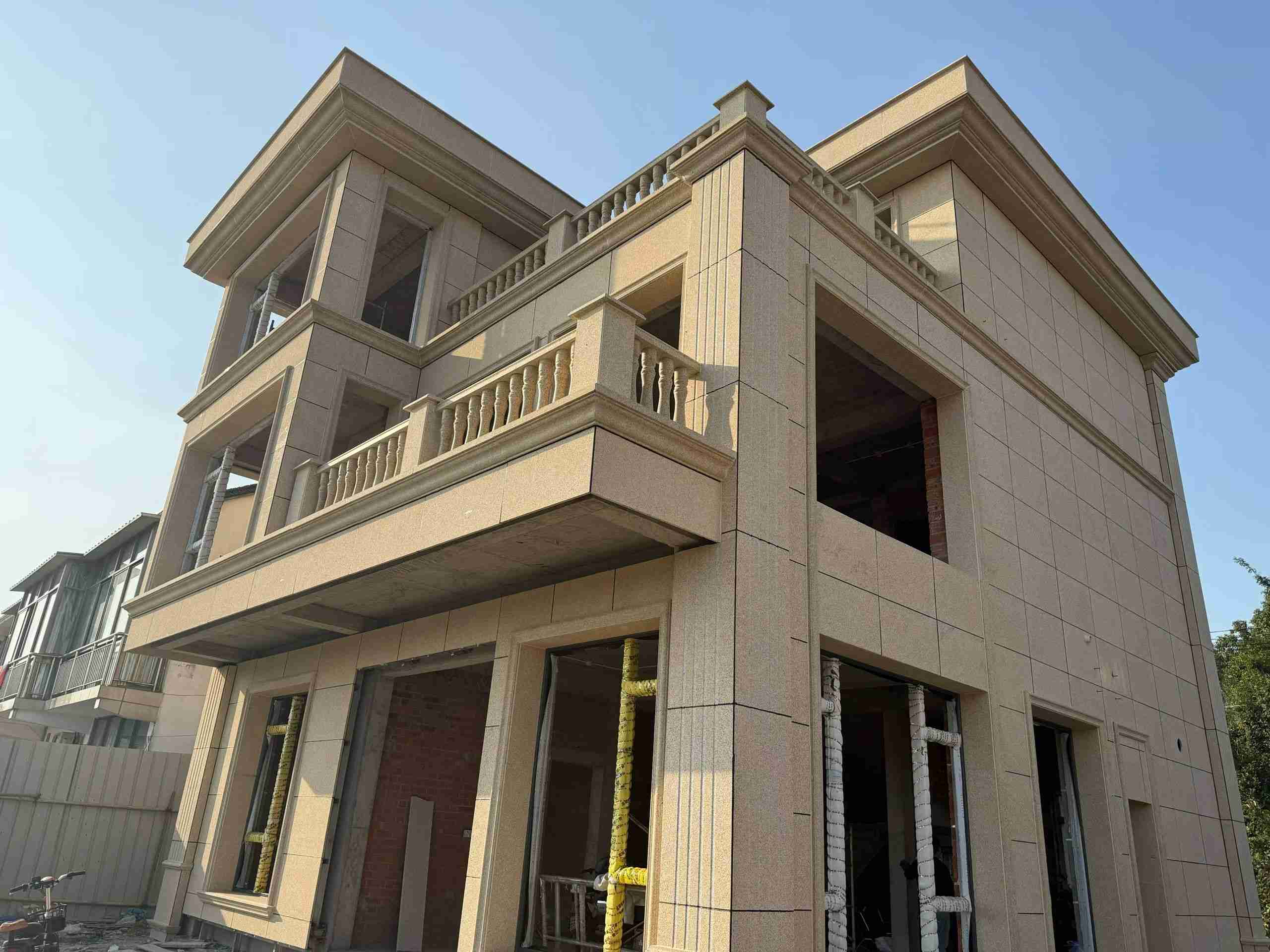 珠海 黄金麻花岗岩石材荔枝面外墙干挂效果展示